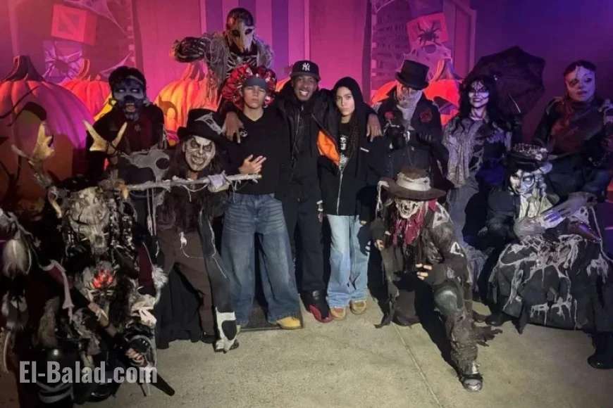 Nick Cannon’s Twins Nearly Tower Over Him at Halloween Theme Park