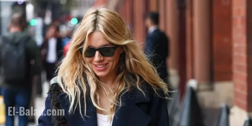 Sienna Miller Elevates High Street Fashion with Chic Coat and Jeans Ensemble