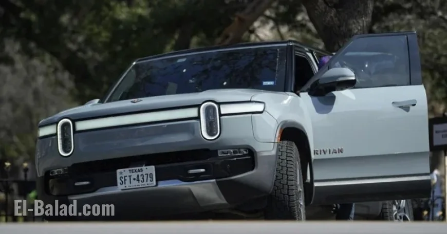 Rivian Cuts Hundreds of Jobs as EV Demand Slows