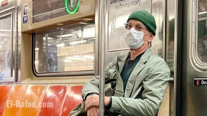Tom Hanks Disguises Himself with Mask and Beanie on NYC Subway
