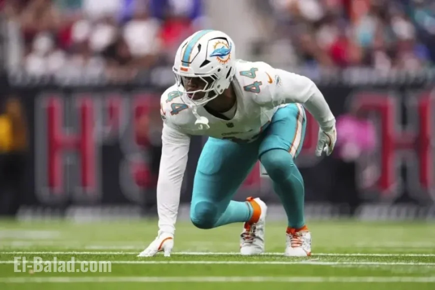 Dolphins’ Chop Robinson Leaves Game Due to Concerning Head Injury