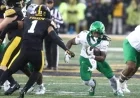 Oregon Strengthens CFP Bid with Bold Victory Over Iowa in ‘Big Ten Style’