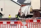 Bin Lorry Hits Building: One Dead, Two Injured