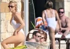 Sydney Sweeney Flaunts Curves in White Swimsuit on Holiday with Scooter Braun