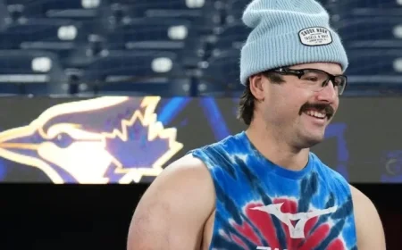 Blue Jays’ Davis Schneider Strolls Barefoot in Park Before Game 6