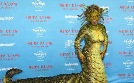Heidi Klum’s 2025 Halloween reveal: a full-creature Medusa with animatronic snakes—and Tom Kaulitz as her stone-struck victim