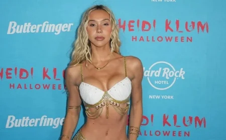 Livvy Dunne Dons Pamela Anderson Costume; Clemens Embraces Kiss, Geno’s Snickers Insight
