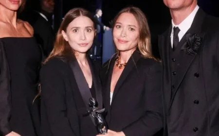 Olsen Twins Make Rare Joint Appearance in Matching Outfits for Award Ceremony