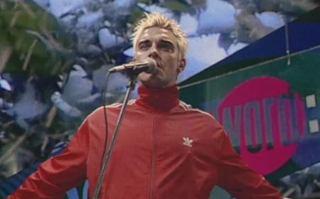 Robbie Williams Revisits ‘The Word’ Stage in New ‘Pretty Face’ Video