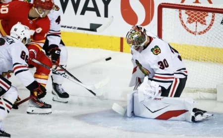 Spencer Knight, Connor Bedard Propel Blackhawks to Victory Over Flames Despite Nazar Injury
