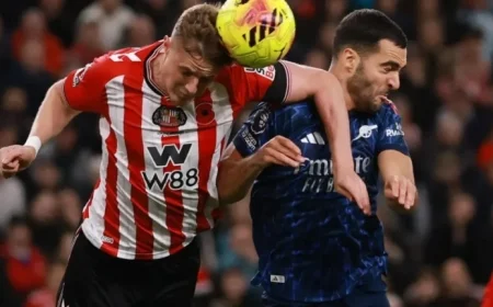 Arsenal’s Mikel Merino Requires Urgent Care After Head Injury; Fans Demand Red Card