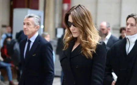 Carla Bruni’s Subtle Elegance Shines at Sarkozy’s Bail Hearing Exit