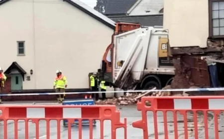 Bin Lorry Hits Building: One Dead, Two Injured
