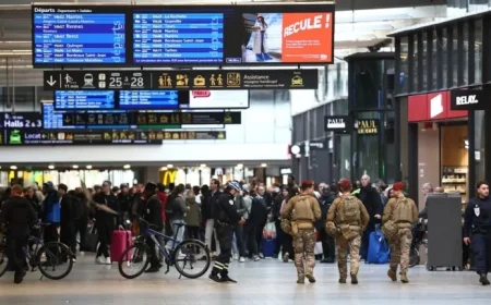 Police Shoot Knifeman Threatening Woman and Child at Station