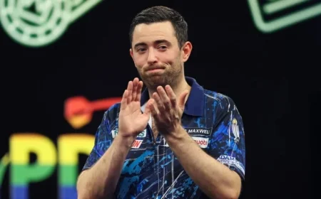 Luke Humphries Battles Severe Pain in Grand Slam of Darts Tournament