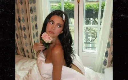 Kylie Jenner Poses with Sheet in Alluring Instagram Photo