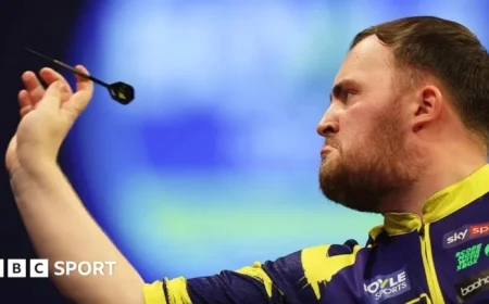 Luke Littler Nears World Number One in Grand Slam of Darts