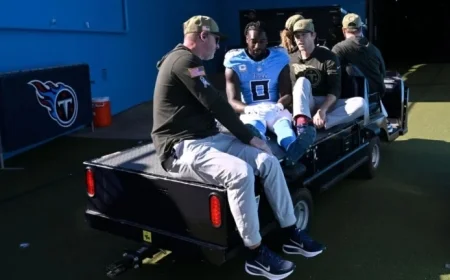 Titans’ Ridley Exits Game with Ankle Injury