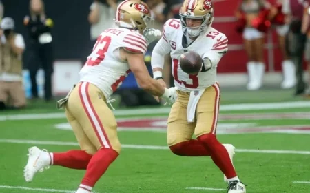 Purdy and McCaffrey Shine with Three Touchdowns Each