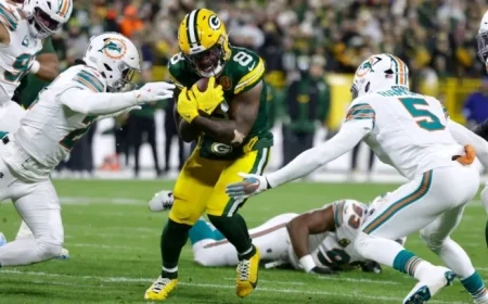 Packers’ Josh Jacobs Misses Vikings Game Due to Knee Injury