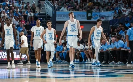 Lucas Critiques North Carolina Athletics in “Two Much”