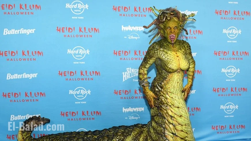 Heidi Klum’s 2025 Halloween reveal: a full-creature Medusa with animatronic snakes—and Tom Kaulitz as her stone-struck victim