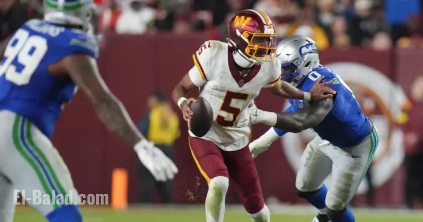 Commanders’ QB Daniels Exits Game with Apparent Elbow Injury