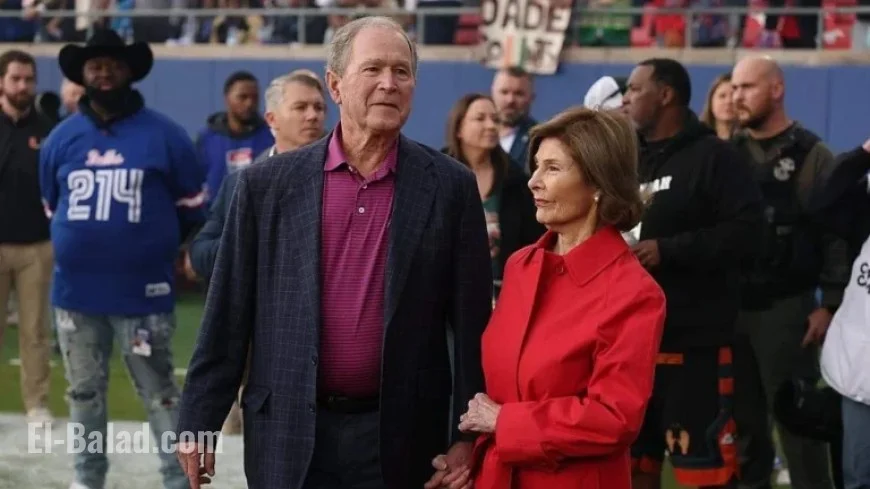 Former U.S. President Tosses Coin at Cowboys vs. Cardinals Game