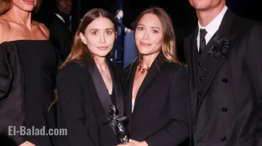 Olsen Twins Make Rare Joint Appearance in Matching Outfits for Award Ceremony
