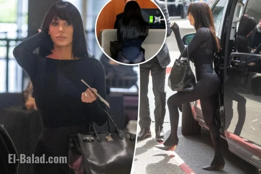Bianca Censori Stuns Melbourne Airport in Thong, Birkin Bag Outfit