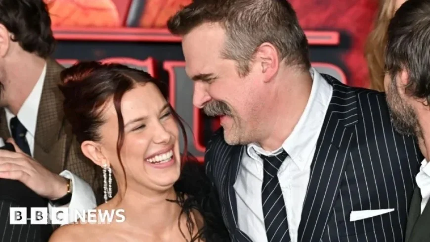 Millie Bobby Brown, David Harbour Embrace at Stranger Things Premiere
