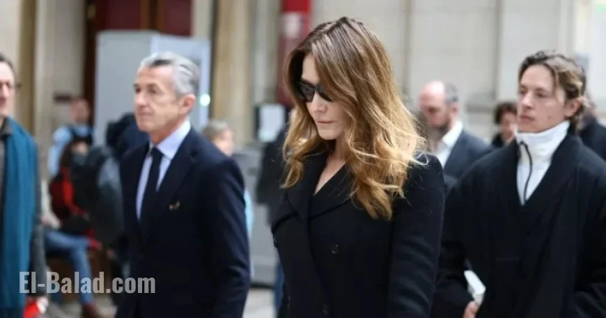 Carla Bruni’s Subtle Elegance Shines at Sarkozy’s Bail Hearing Exit