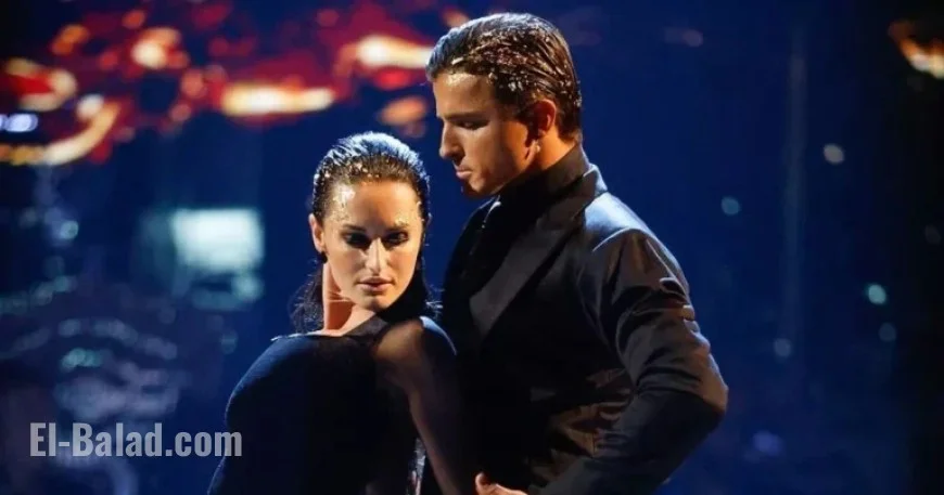 Amber Davies and Nikita Kuzmin Address ‘Strictly Curse’ with Kiss Photo