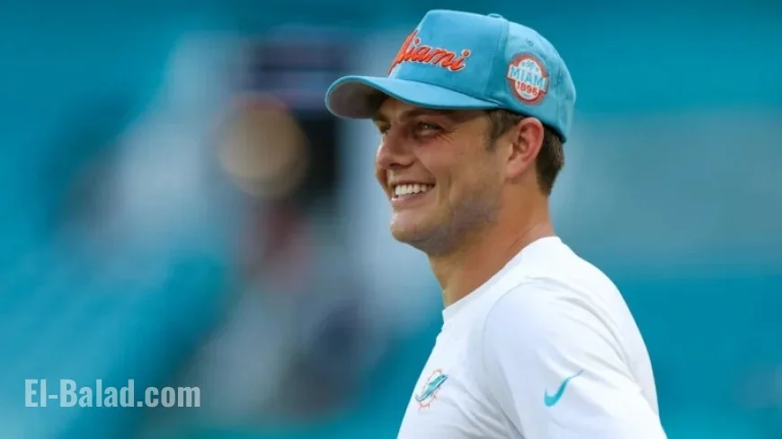 Zach Wilson’s Wife Nicolette Wows in Sleeveless Dolphins Top During Buffalo Win