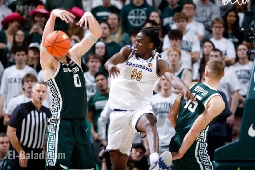 Tom Izzo Reacts as Michigan State Towers Dominate with 34 Points, 25 Rebounds