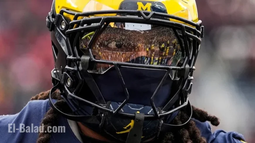 Michigan’s Jaishawn Barham Avoids Ejection for Helmet Hit on Official