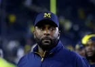 Ex-Michigan Coach Sherrone Moore Charged with Home Invasion: NPR
