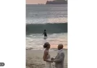 Batman Surprises Beach Wedding with Unexpected Visit
