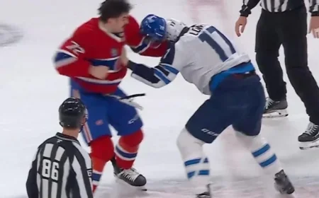 Arber Xhekaj Floors Adam Lowry in Intense Center-Ice Clash