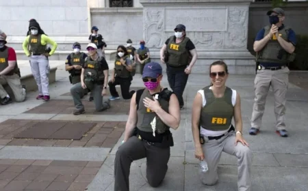 FBI Agents Sue Alleging Unlawful Dismissal Over Protest Kneeling