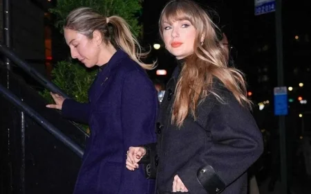 Taylor Swift Wears Luxe Louis Vuitton Coat and Leather Boots to Dinner with Este Haim