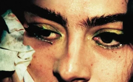 Charli XCX Hides in Giant Lighter: New “The Moment” Trailer Released