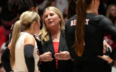 Dani Busboom Kelly Raises Championship Banner in Nebraska Homecoming