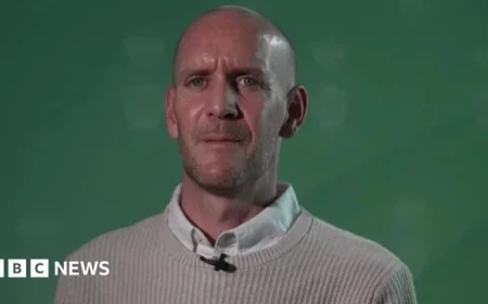 Liverpool Fan Dan Barr Prevents Paul Doyle’s Drive into Parade Crowd