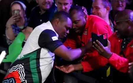 Veterinarian David Munyua Upsets 18th Seed Mike De Decker at World Darts Championship