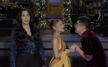 Cher Urges Ariana Grande and Bowen Yang to ‘Snap Out of It’ in SNL Teaser