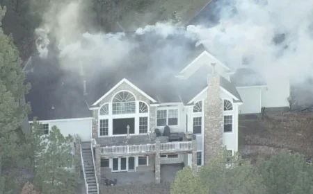 Colorado Firefighters Swiftly Battle Franktown Garage Fire Spreading to Home