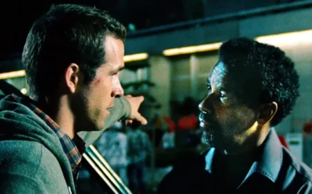 Ryan Reynolds Drives Denzel Washington to Laughter in Departing Netflix Spy Film