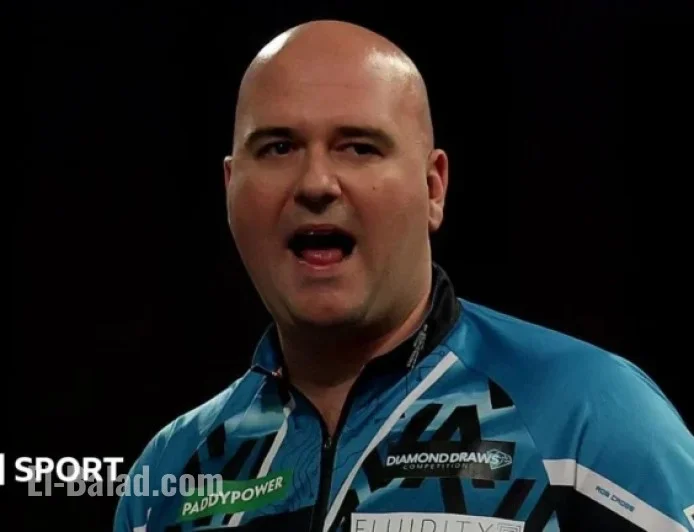 Rob Cross and Ryan Searle Advance to World Darts Championship Round Two