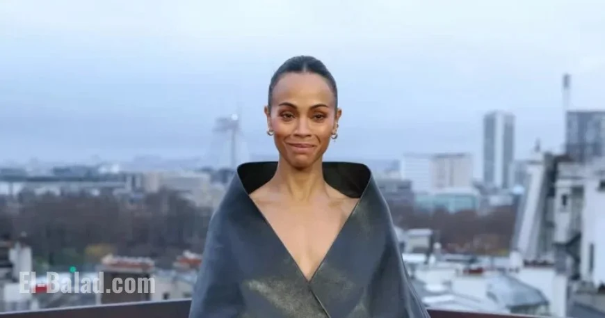 Zoe Saldaña Elevates Fashion with Chic Funnel Neck Coat